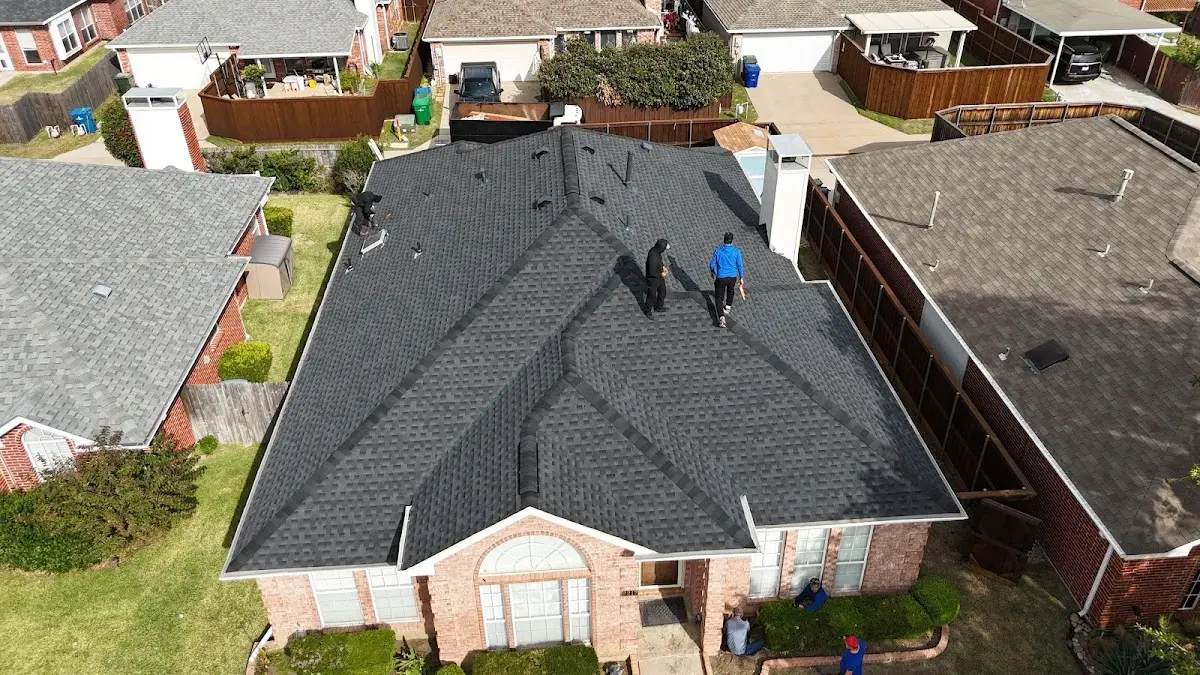 Slate & Tile Roof Repair work in progress on a Cahokia Heights property